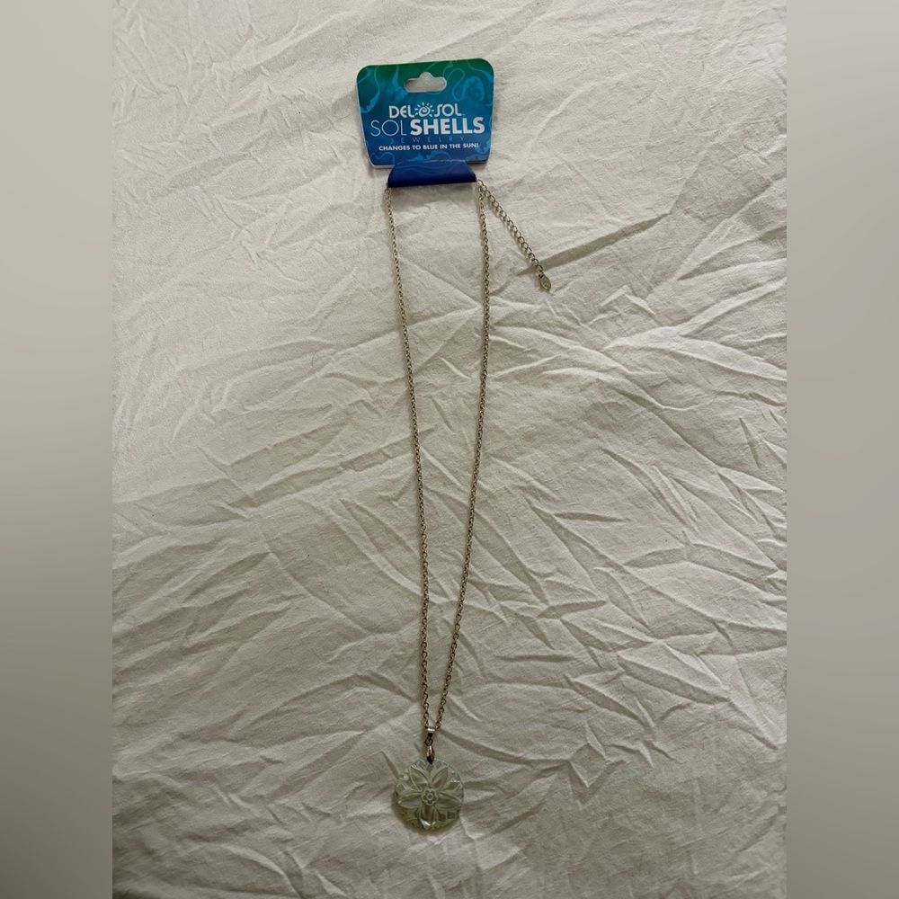 Del Sol Color Changing Sand Dollar Necklace and Color changing Star Earrings.